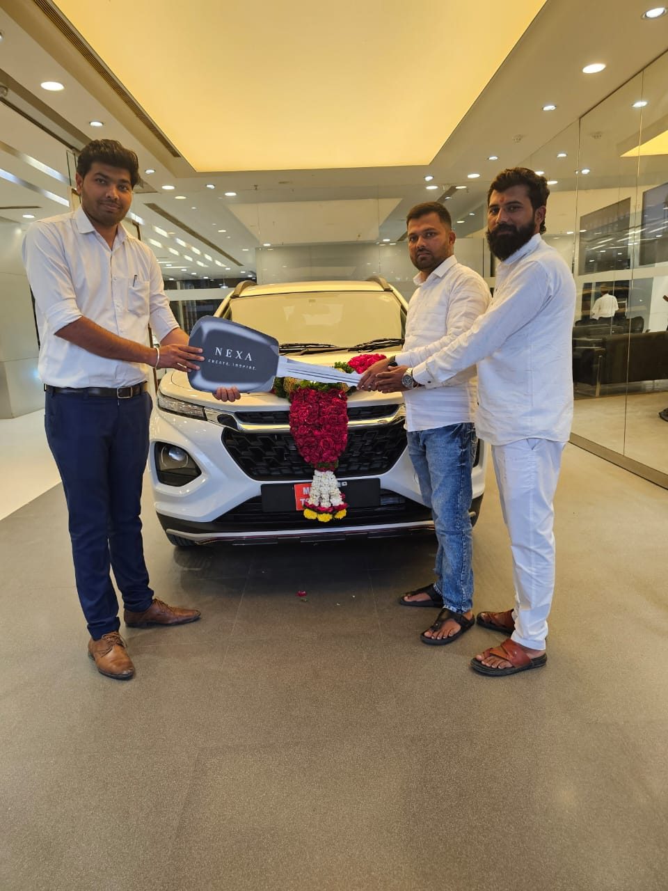 New Nexa car delivery for the Pragati Tours and Travels fleet