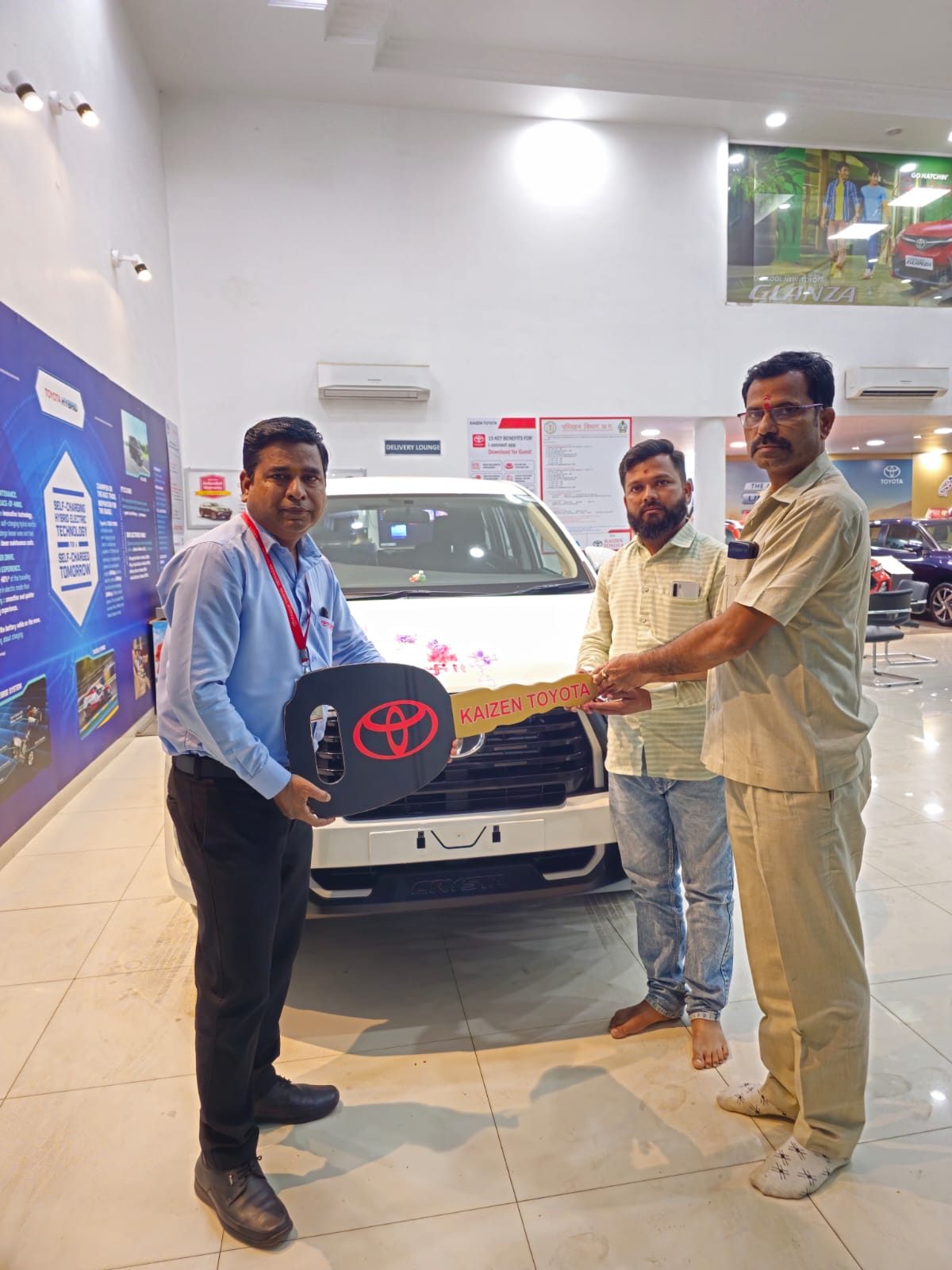 Toyota Innova Crysta key handover - Pragati Tours and Travels fleet expansion