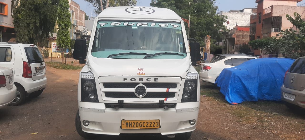 Pragati Tours and Travels team with a new fleet car